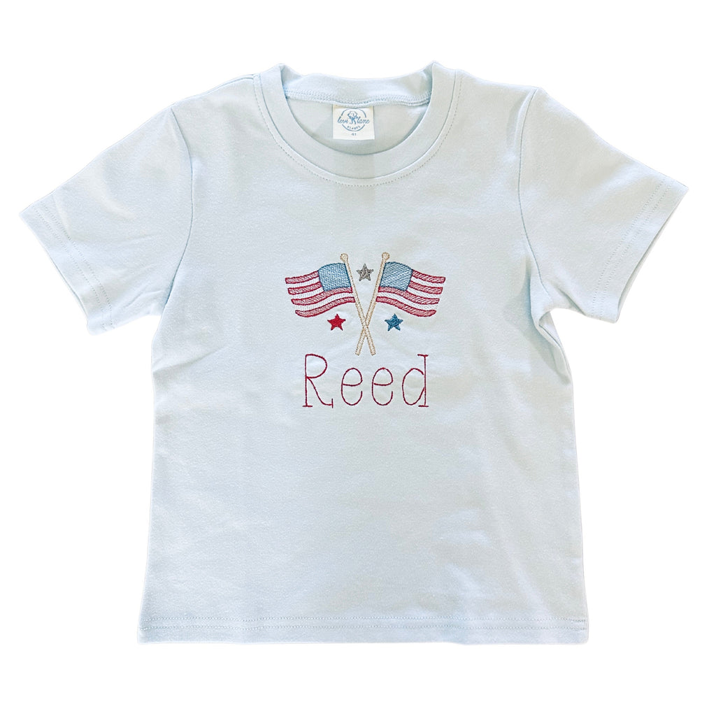Blue t shirt with flags embroidered