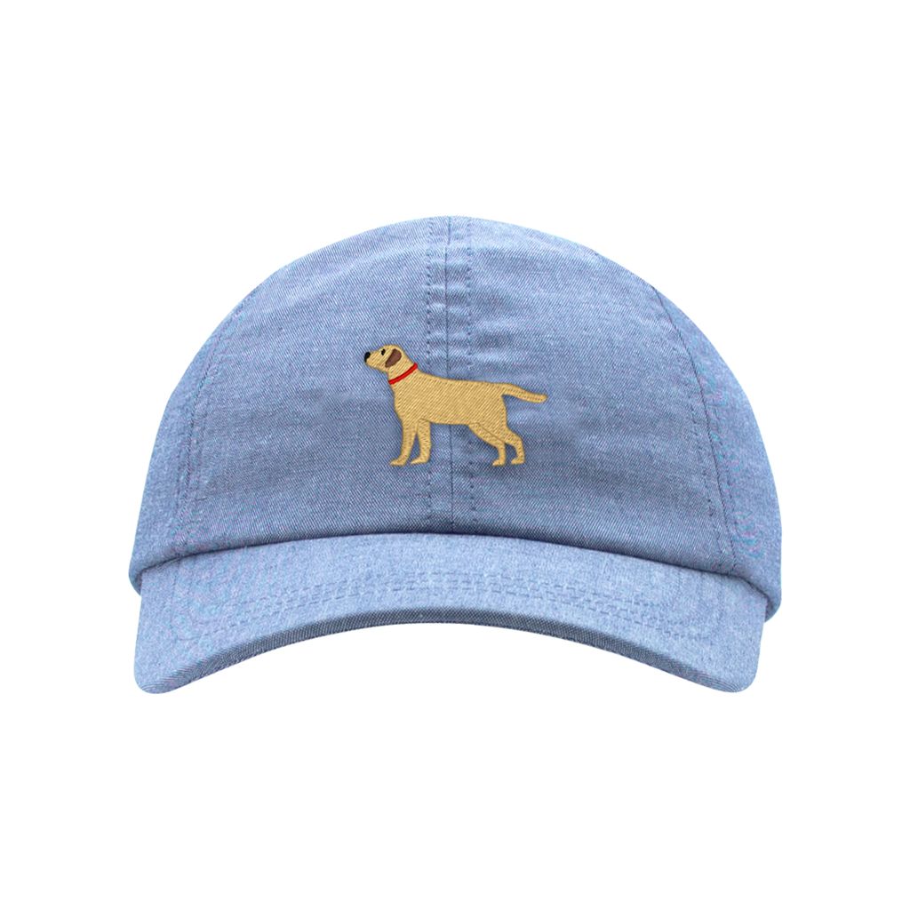 Blue ball cap with embroidered puppy on white background